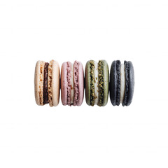 Colorful assortment of macarons on a white background, showcasing different flavors and textures, perfect for dessert enthusiasts and food photography lovers.