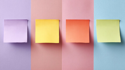 Four colored sticky notes aligned on various pastel colored backgrounds