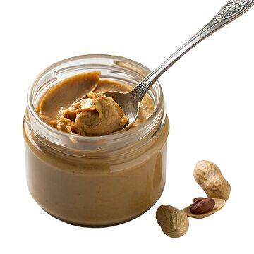 Mantequilla de cacahuete en tarro con cuchara y cacahuetes sobre fondo blanco