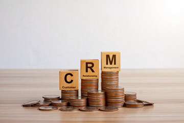 CRM. Sales professional using mobile smartphone and CRM icon network connection to manage customer data with growth insights, sales analytics, driving business efficiency and customer satisfaction.