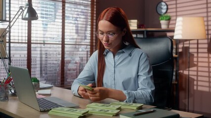 Business female woman businesswoman counting money cash finance happy smiling looking at camera in office girl worker in company count financial success achievement salary startup growth working job - Powered by Adobe