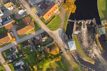 Small dam in a European village, aerial drone panoramic view
