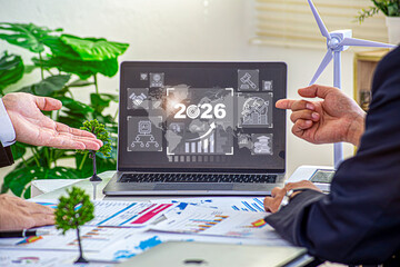 Businessman plan strategy marketing and finance to goal in 2026 planning business growth with technology AI and environmental care to New Year resolutions business. digital transformation 2026