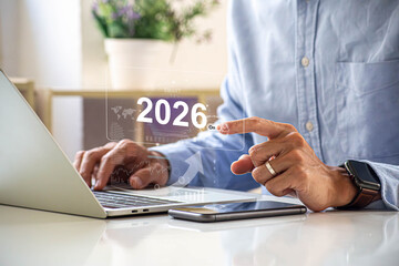 Businessman plan strategy marketing and finance to goal in 2026 planning business growth with...