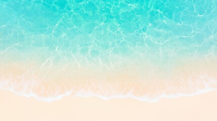 Beach shoreline with turquoise ocean waves washing onto yellow sand viewed from above. Aerial beach image for banner with copy space. Summer vacation and tropical paradise concept.