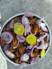 Chicken kabab with different ingredients onions and garlic and lemon 