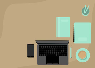 Top view of table, laptop and mobil phone and coffee. Work from home situation.