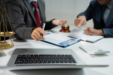 Businessman and Male lawyer or judge consult having team meeting with client, Law and Legal services concept in office.