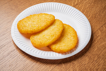 Golden potato patties on a plate promise a tasty treat for any occasion