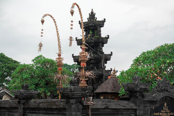 Majestic Buddhist temple decorated for the festival with traditional relations under cloudy sky