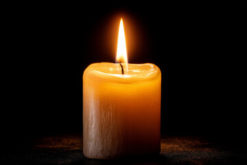 Single lit candle with quite flame
