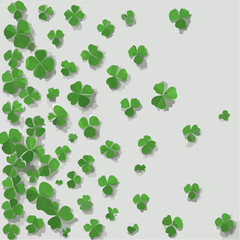 Fototapeta premium A scattered pattern of green shamrocks with shadows on a light gray background, creating a whimsical and festive St Patrick's Day themed design element.
