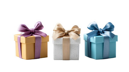Obraz premium Three beautifully wrapped gift boxes in vibrant colors with elegant bows, isolated on a clean background