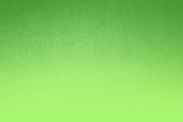 Very bright green tone color paint on blank eco environmental friendly cardboard box paper texture background with space minimal style 
