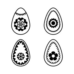 Set of 4 black decorative egg shapes with geometric and floral patterns isolated on white background. Ethnic collection of Easter design elements.