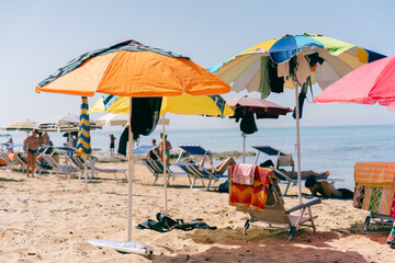 Colorful Beach Umbrellas and Summer Seaside Scene