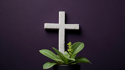 Obraz premium Minimalist Christian Cross on Deep Purple Background with Green Plant Symbolizing Faith and Renewal