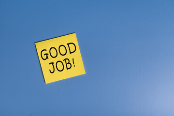 good job words text on yellow sticky notes isolated on blue background