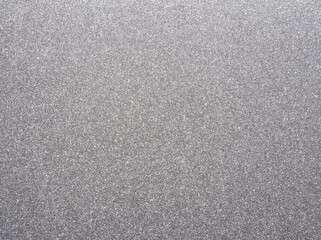 Silver sparkle background. Silver glitter background. Metallic gray glimmer. Abstract twinkle texture. Glitter surface. Glimmer layout. Holiday layout. Diamond luxury surface. Celebration background.	