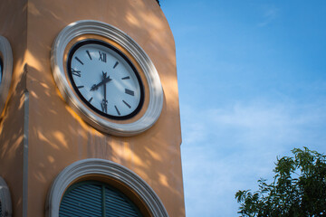 Vintage Clock Tower Against Blue Sky