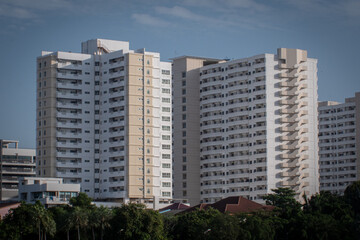 Modern High-Rise Apartment Buildings with Blue Sky