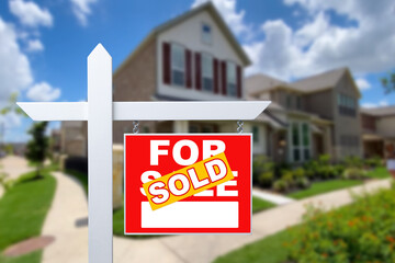 Sold Home For Sale Sign in Front of New House.