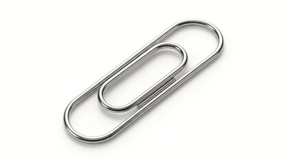 Stock photo of silver metal paper clip isolated on white background for office and school supplies use