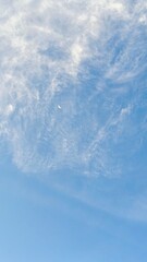 Obraz premium blue sky with cloud closeup, used as background.