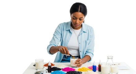 Woman Making Candles Adding Scent in a Bright Studio