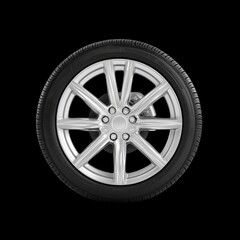 Obraz premium Silver Alloy Wheel with Tire on Black Background for Automotive Use