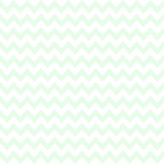 Seamless chevron pattern with pastel mint green zigzag lines on white background