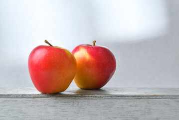 Red Apple on Wooden Table.