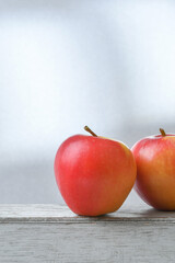 Red Apple on Wooden Table.