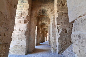 Stone Corridors and Arched Passageways Inside El Jem Amphitheater in Tunisia &ndash; Echoes of Roman Gladiator History