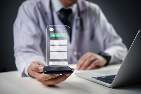 Doctor using smartphone to demonstrate futuristic telemedicine app with video call, prescriptions, and heart rate monitoring in smart healthcare system. mobile medical services health diagnostics.