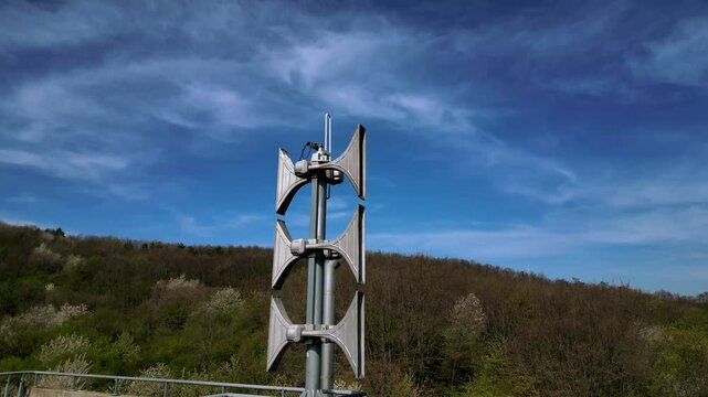 siren on the mast announces the alarm with high-pitched sounds. it is audible thanks to several rows of trumpets, amplions. variable fluctuating sounds. chemical, fire, air alarm, blue sky