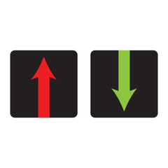 Red up arrow and green down arrow on a white surface