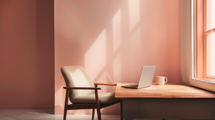 Fototapeta premium Minimalist pastel pink office featuring a wooden desk with an open laptop and coffee cup, bathed in gentle sunlight, creating a serene and tranquil workspace. 