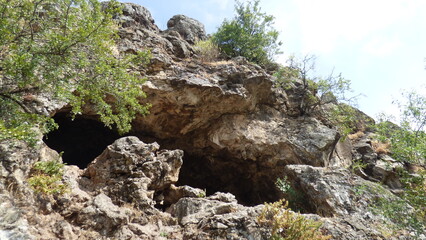 Cave in the mountains of the Crimean peninsula on a summer day