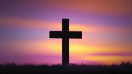 Good Friday concept featuring a silhouette wood cross against a blurred sunset background