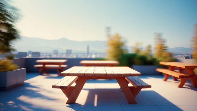 Blurred Background of Calm Rooftop Garden with Picnic Tables and Urban Landscape in Background, Green Plants, Sunny Day, Outdoor Area for Relaxation and Gatherings