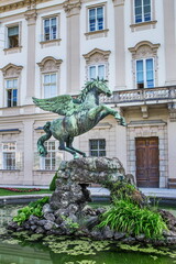 Naklejka premium fountain with Pegasus sculpture in Mirabell garden in Salzburg