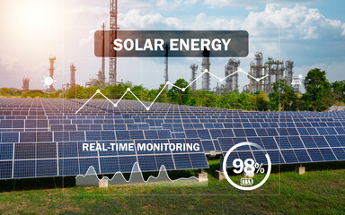 Solar panels in a field generating renewable energy, with digital data overlay showing real-time monitoring and efficiency at 98%, against a backdrop of industrial towers