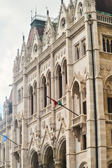 Hungarian Parliament Building in the evening at the Danube river in Budapest, Hungary. High quality photo