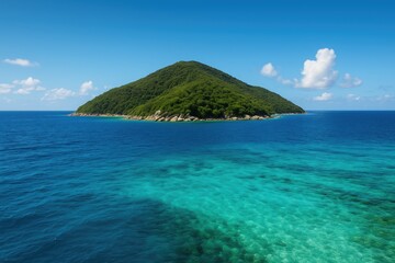 Fototapeta premium Scenic view of a lush island encircled by ocean on a bright sunny afternoon