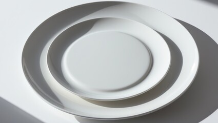 Obraz premium Top view of an isolated white porcelain dish on a clean background