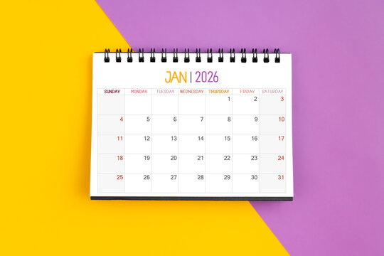 January 2026 Monthly desk calendar for 2026 year on yellow and purple color background.
