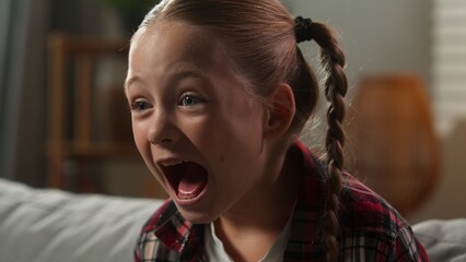 Close up portrait stressed child little Caucasian kid girl daughter baby irritated rage made fear afraid stress loud yelling screaming shout at home pediatric family custody problem yelling shouting