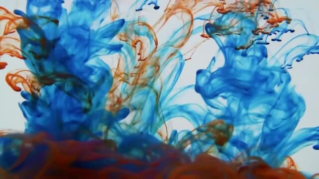 Abstract Blue and Orange Ink Swirls in Water A Mesmerizing Fluid Art Photograph