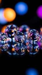 Colorful Transparent Spheres Reflecting Bokeh Lights Dark Background Wallpaper image